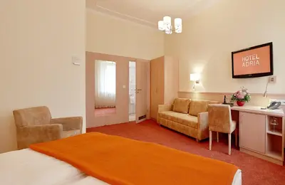 Ein Bett oder Betten in einem Zimmer der Unterkunft Hotel ADRIA München