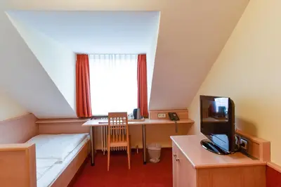 TV/Unterhaltungsangebot in der Unterkunft Hotel ADRIA München