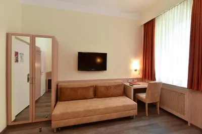 TV/Unterhaltungsangebot in der Unterkunft Hotel ADRIA München