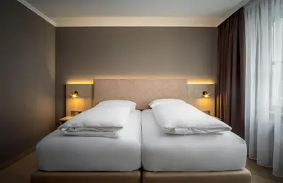 Ein Bett oder Betten in einem Zimmer der Unterkunft AWA Hotel