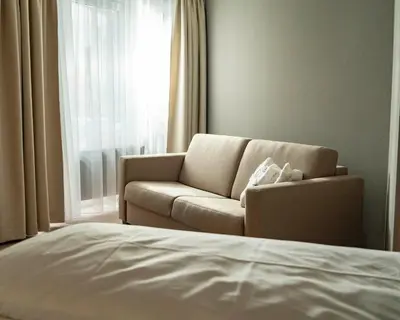 Ein Sitzbereich in der Unterkunft AWA Hotel