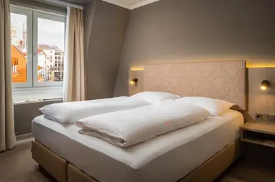 Ein Bett oder Betten in einem Zimmer der Unterkunft AWA Hotel