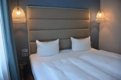 Ein Bett oder Betten in einem Zimmer der Unterkunft Belle Blue Zentrum