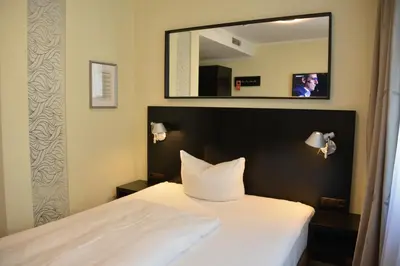 Ein Bett oder Betten in einem Zimmer der Unterkunft Belle Blue Zentrum