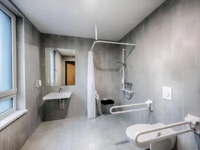 Ein Badezimmer in der Unterkunft B&B Hotel München-Putzbrunn