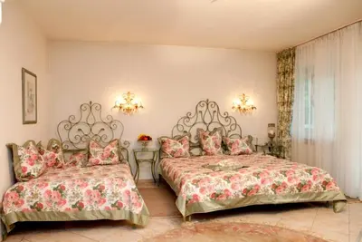 Ein Bett oder Betten in einem Zimmer der Unterkunft Seibel's Park Hotel