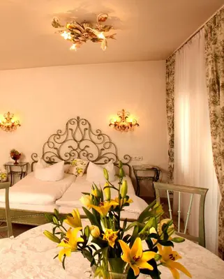 Ein Bett oder Betten in einem Zimmer der Unterkunft Seibel's Park Hotel
