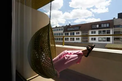 Ein Balkon oder eine Terrasse in der Unterkunft Cocoon Stachus