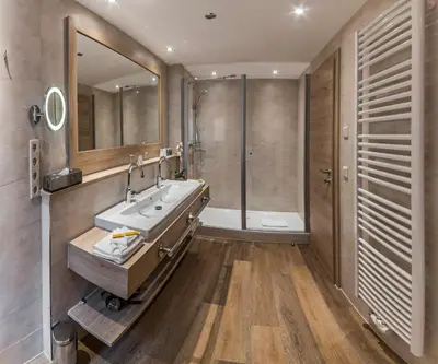 Ein Badezimmer in der Unterkunft Drei Loewen