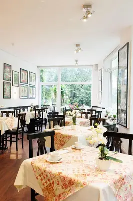 Ein Restaurant oder anderes Speiselokal in der Unterkunft Hotel Nymphenburg City - München