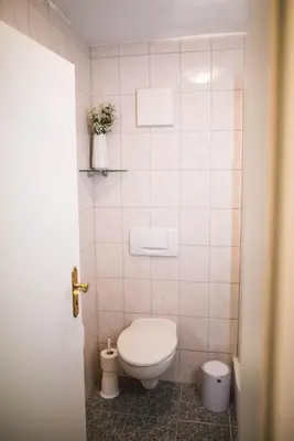 Ein Badezimmer in der Unterkunft Hotel Domizil