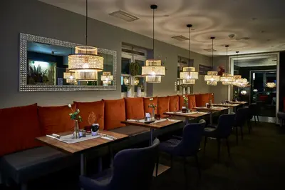 Ein Sitzbereich in der Unterkunft Hotel Domizil