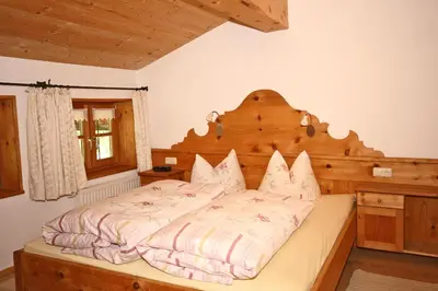 Ein Bett oder Betten in einem Zimmer der Unterkunft Bergbauernhof Simmerl