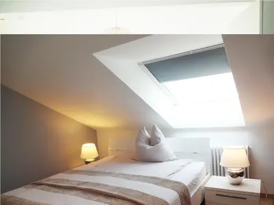 Ein Bett oder Betten in einem Zimmer der Unterkunft Moderne Wohnungen am Bahnhof Dachau mit direkter S-Bahn Verbindung nach München