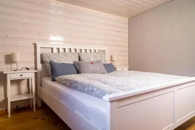 Ein Bett oder Betten in einem Zimmer der Unterkunft Alpenchalet Sachrang