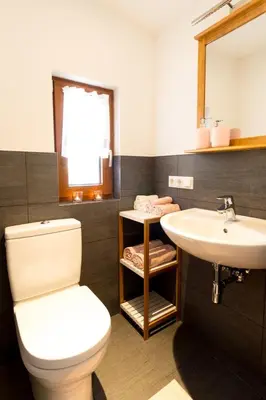 Ein Badezimmer in der Unterkunft Alpenchalet Sachrang