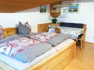 Ein Bett oder Betten in einem Zimmer der Unterkunft Ferienwohnung Bergblickl