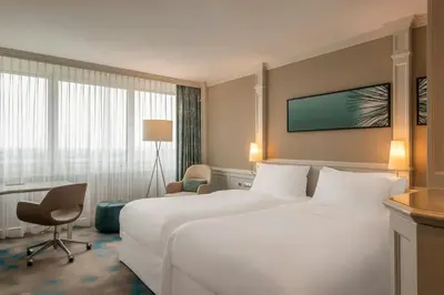Ein Bett oder Betten in einem Zimmer der Unterkunft The Westin Grand Munich