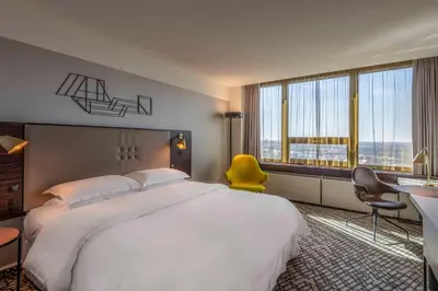 Ein Bett oder Betten in einem Zimmer der Unterkunft Four Points by Sheraton Munich Arabellapark