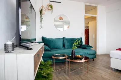 Ein Sitzbereich in der Unterkunft Modernes Apartment mit tollem Blick über die Stadt
