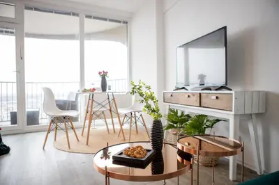 TV/Unterhaltungsangebot in der Unterkunft Modernes Apartment mit tollem Blick über die Stadt
