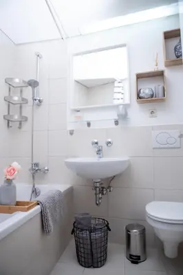 Ein Badezimmer in der Unterkunft Modernes Apartment mit tollem Blick über die Stadt