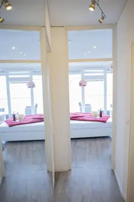 Ein Bett oder Betten in einem Zimmer der Unterkunft Modernes Apartment mit tollem Blick über die Stadt