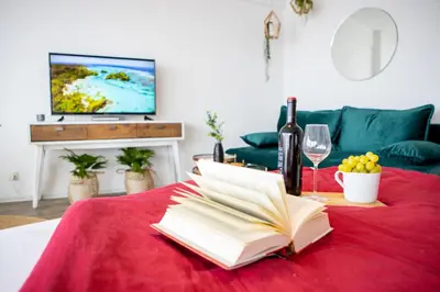 TV/Unterhaltungsangebot in der Unterkunft Modernes Apartment mit tollem Blick über die Stadt