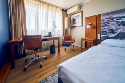 Ein Bett oder Betten in einem Zimmer der Unterkunft Arthotel Ana im Olympiapark