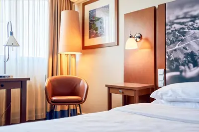 Ein Bett oder Betten in einem Zimmer der Unterkunft Arthotel Ana im Olympiapark