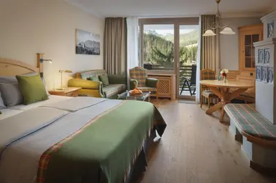 Ein Bett oder Betten in einem Zimmer der Unterkunft Arabella Alpenhotel am Spitzingsee, a Tribute Portfolio Hotel