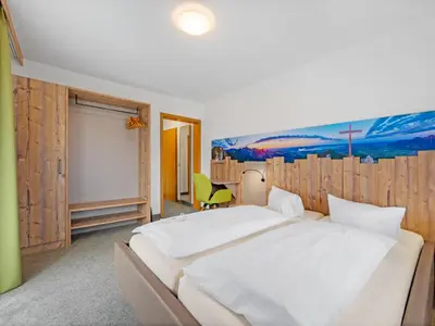 Ein Bett oder Betten in einem Zimmer der Unterkunft Landhotel Gabriele