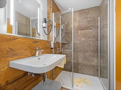 Ein Badezimmer in der Unterkunft Landhotel Gabriele