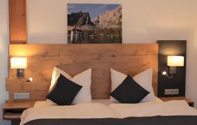 Ein Bett oder Betten in einem Zimmer der Unterkunft Zum Goldenen Schwanen