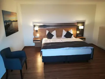 Ein Bett oder Betten in einem Zimmer der Unterkunft Zum Goldenen Schwanen