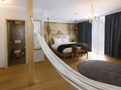 Ein Bett oder Betten in einem Zimmer der Unterkunft DORMERO Hotel München-Kirchheim Messe