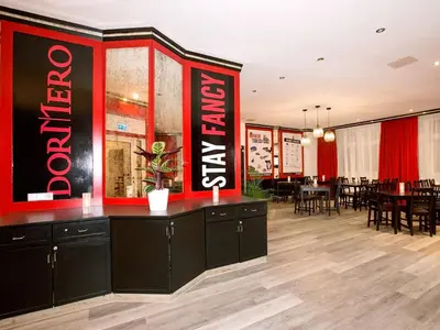 Ein Sitzbereich in der Unterkunft DORMERO Hotel München-Kirchheim Messe