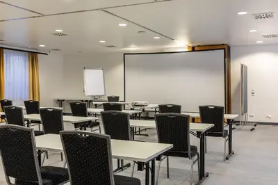 Der Geschäftsbereich oder Konferenzraum in der Unterkunft MEAT UND STAY Hotel