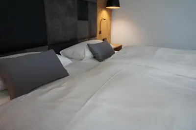 Ein Bett oder Betten in einem Zimmer der Unterkunft Hotel Grüner Baum