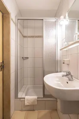 Ein Badezimmer in der Unterkunft Hotel-Gasthof Zum Dragoner
