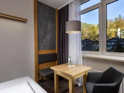 Ein Bett oder Betten in einem Zimmer der Unterkunft Mercure Hotel Garmisch Partenkirchen