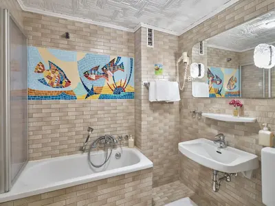 Ein Badezimmer in der Unterkunft Hotel Alfa Zentrum