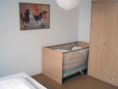 Ein Bett oder Betten in einem Zimmer der Unterkunft Ferienwohnung Hartinger