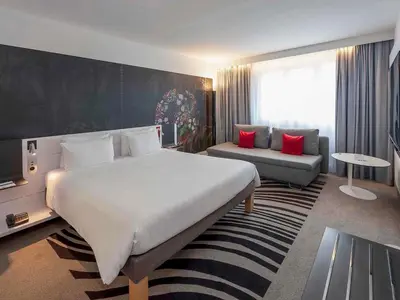 Ein Bett oder Betten in einem Zimmer der Unterkunft Novotel München City