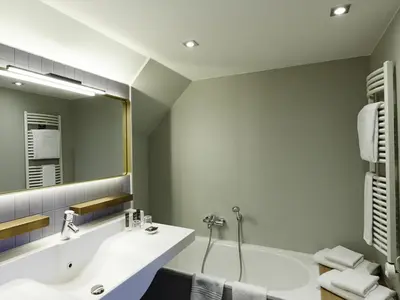 Ein Badezimmer in der Unterkunft Novotel München City