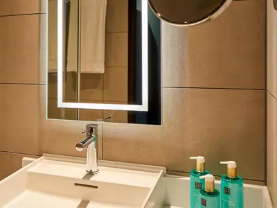 Ein Badezimmer in der Unterkunft Novotel München City