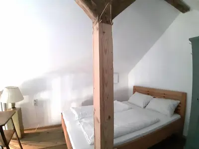 Ein Bett oder Betten in einem Zimmer der Unterkunft Saulgrub Alpen Loft