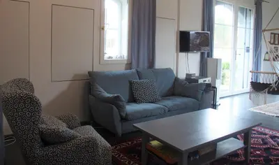 Ein Sitzbereich in der Unterkunft Saulgrub Alpen Loft