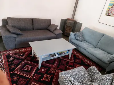 Ein Sitzbereich in der Unterkunft Saulgrub Alpen Loft