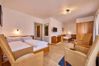 Ein Bett oder Betten in einem Zimmer der Unterkunft Hotel Antonia
